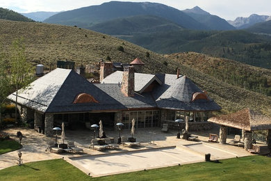 Example of an arts and crafts exterior home design in Denver