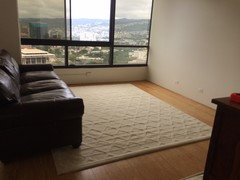 Does the rug need to also be under the TV stand's front legs? How else do I  make this room look nice aside from art on the walls? Curtains? Paint?  (Just moved