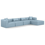Meridian Furniture - Cube Upholstered Modular Sectional, Light Blue, 5-Piece: 2 Armless Chair, 2 Corner Chair, 1 Ottoman, Vegan Leather - Elevate your space with the luxurious Cube Vegan Leather Modular Sectional. This modular sectional exudes modern elegance, charm, and comfort making it a perfect addition to any contemporary living space. Its clean lines and cube shape are reminiscent of minimalist design, while the plush light blue vegan leather upholstery adds a touch of luxury and sophistication. The chair's versatile construction and geometric aesthetic seamlessly integrate into various design styles, from sleek living rooms to chic home offices, embodying the essence of modern design and creating a sense of order and tranquility in your space.