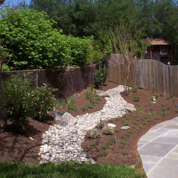 Silver Spring foundation planting and dry creek bed