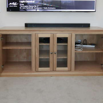 Custom Traditional TV Console with Wood and Glass Doors