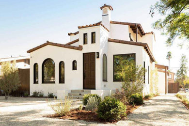 Example of a tuscan home design design in Los Angeles