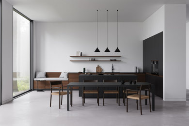 Example of a trendy l-shaped eat-in kitchen design in San Francisco with flat-panel cabinets, dark wood cabinets and an island