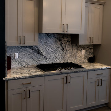 Granite Kitchen Countertops- Waterfall Edges & Full Height Backsplash
