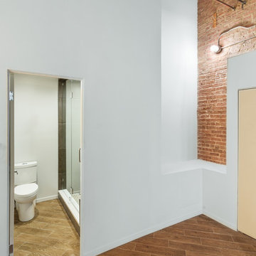 Golden Wood & Dark Charcoal Bathroom with Luxurious Steam Shower