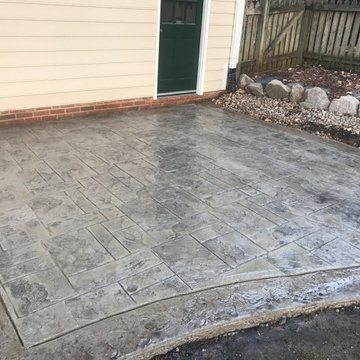 Ashlar slate stamped concrete patio installation