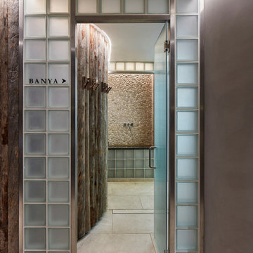 Glass-block threshold to sauna suite