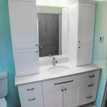 Mint green blue and white bathroom