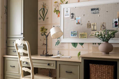 Large elegant l-shaped porcelain tile, beige floor and wallpaper laundry room photo in Indianapolis with an utility sink, recessed-panel cabinets, green cabinets, quartz countertops, multicolored walls, a side-by-side washer/dryer and beige countertops
