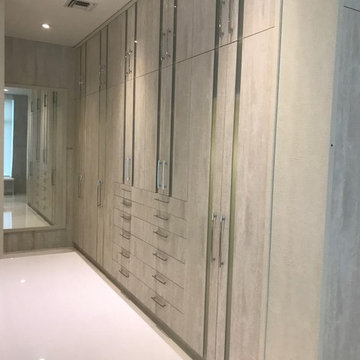 Master Walk-in closet, Textured melamine with Glass inserts design by VelArt