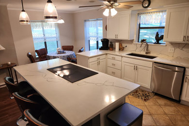 Example of a transitional kitchen design in Other