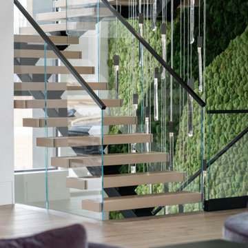 Electic Switchback Staircase with Glass Railing