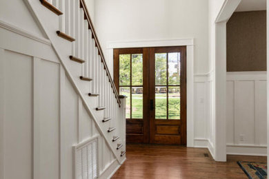 Example of a huge classic entryway design in Other