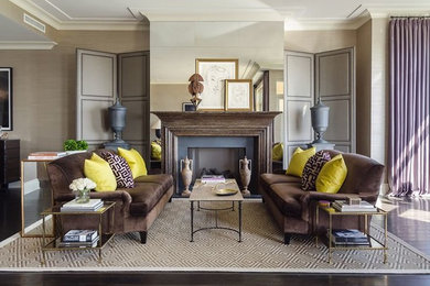 Transitional formal and open concept brown floor living room photo in Chicago with beige walls, a standard fireplace, a wood fireplace surround and no tv