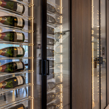 Custom Staircase Glass Wine Cellar & Display Cabinet in Newport Beach