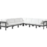 Meridian Furniture - Nizuc Water Resistant Patio L-Shaped Modular Sectional, White, 7-Piece: 4 Armless Chair, 3 Corner Chair, Dark Gray Aluminum Frame - Pick and choose your favorites from the Nizuc collection to create a modular seating group the whole gang will enjoy. The sturdy aluminum frame provides dependable support for friends and family as they relax and unwind, and the resilient white water resistant fabric stands up to the elements without losing its beautiful demeanor, so you can count on it lasting for the long haul. Latches beneath these seating pieces help you easily attach them to one another for convenient setup.