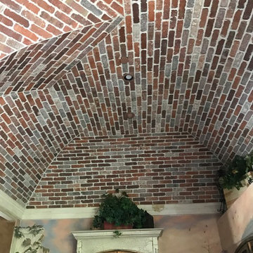 Tuscan style home with custom carpentry