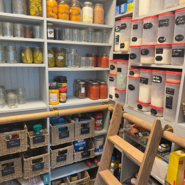 Apothecary-Style Pantry with Built-In Ladder and Vintage Details
