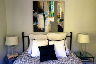 Bedroom - mid-sized contemporary guest carpeted bedroom idea in Other with gray walls