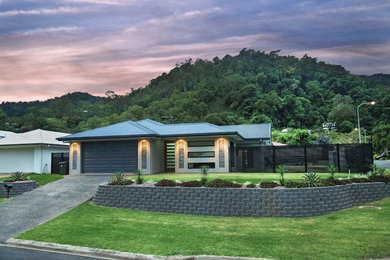 Photo of a large contemporary one-storey exterior in Cairns.