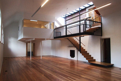 This is an example of a large contemporary home design in Hobart.