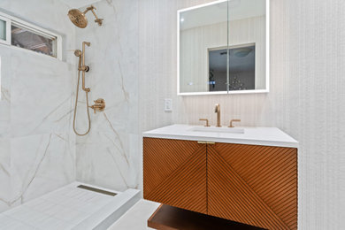 Inspiration for a mid-sized bathroom remodel in San Diego with a floating vanity