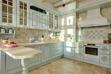 This is an example of a mid-sized country u-shaped separate kitchen in Saint Petersburg with an undermount sink, raised-panel cabinets, turquoise cabinets, solid surface benchtops, beige splashback, ceramic splashback, white appliances, porcelain floors, no island, beige floor and beige benchtop.