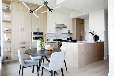 Kitchen/dining room combo - mid-sized contemporary kitchen/dining room combo idea in Vancouver