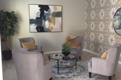 Example of a mid-sized transitional open concept ceramic tile and gray floor living room design in Phoenix with gray walls
