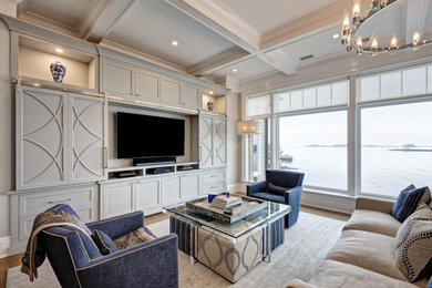 Inspiration for a large coastal formal and open concept light wood floor, gray floor and coffered ceiling living room remodel in New York with gray walls, a wood fireplace surround, a media wall and a two-sided fireplace