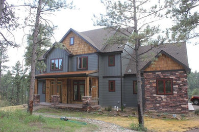 Example of a mountain style exterior home design in Denver
