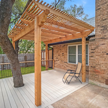 Cedar pergola and composite deck, metal railing with cedar posts