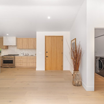 Kitchen Seen Past the Pantry Door and Laundry Room