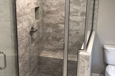 Example of a transitional bathroom design in Other