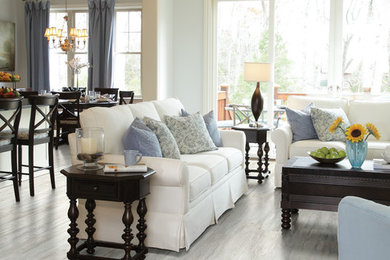 Living room - large traditional formal and open concept light wood floor living room idea in Indianapolis with blue walls, no fireplace and no tv