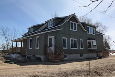Cottage exterior home idea in Other