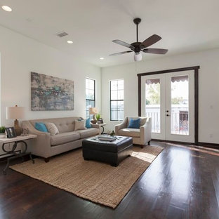 Photo of a medium sized mediterranean open plan living room in Houston with white walls and dark hardwood flooring.