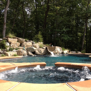 Stroud Township salt water pool with spa, sunshelf, slide, and waterfall