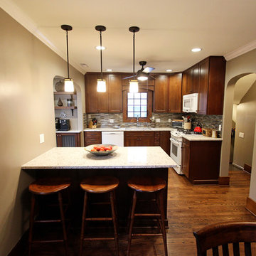 Transitional Cherry Kitchen with Great Organizational Storage and Coat Rack