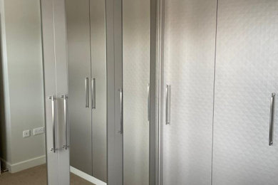 Design ideas for a modern wardrobe in Other.