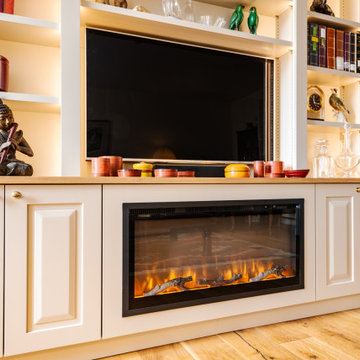 Media wall with integrated electric fire