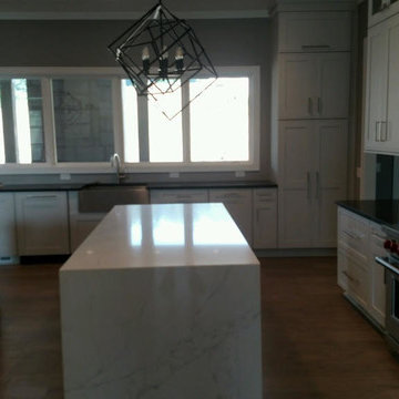 Brown Antique Leathered Granite with Calacatta Fantasy Quartz