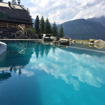 Fresner – Natural Pool against Mountain Panorama Backdrop