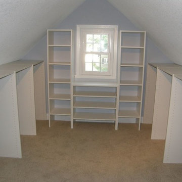 Walk-In Closet with Sloped Ceilings by Closets For Life