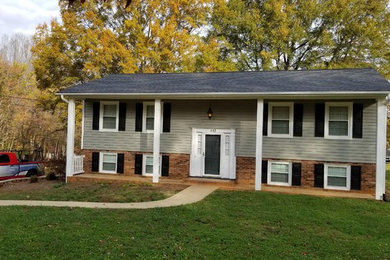 Example of a minimalist exterior home design in Other