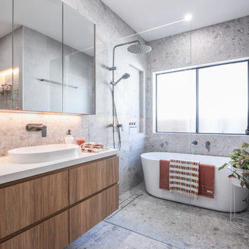 Bathroom with Floating Vanity and Freestanding Bath