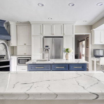 Navy Stained Island, Hood vent and Floating Shelves in White Shaker Kitchen