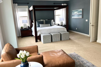 Inspiration for a large coastal carpeted, beige floor and shiplap wall bedroom remodel in Orange County