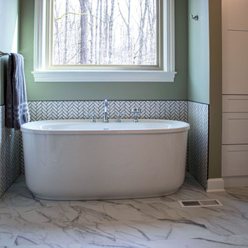 Serene Master Bath with Free Standing Tub, Tiled Shower and Linen Closet