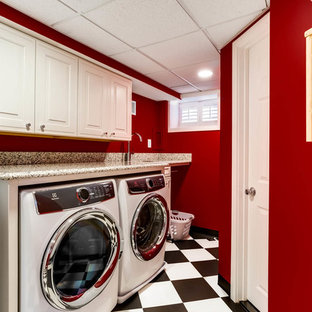 Small traditional galley separated utility room in DC Metro with raised-panel cabinets, white cabinets, granite worktops, red walls, ceramic flooring, a side by side washer and dryer and white floors.